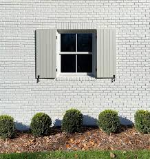install functional wood shutters