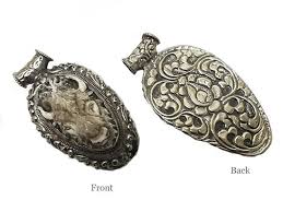 nepal carved bone buffalo pendant