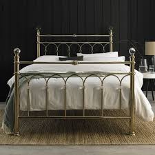This steel slat bed frame can support up to 660 lbs of weight and is built for no squeaking and scratching noise to ensure a good night's sleep. Bentley Cristina Champagne Brass Finish Metal Bed Frame King Size Costco Uk