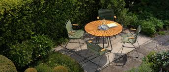 Make the patio large enough to accommodate a small table and at least two chairs. Outdoor Indoor Design Furniture Houe