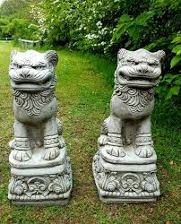 Pair Chinese Foo Dogs On Square Plinth