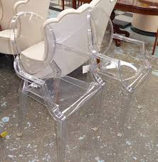 eight kartell louis ghost chairs