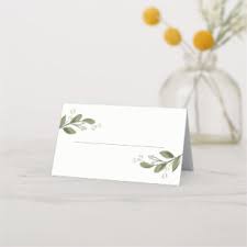 This folded name place card is shown in basic white with a festive holiday christmas bow and gold snowflake print. Name Place Cards Escort Cards Zazzle