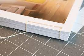 Then place the bound paper wad so that it is centrally resting on the spine board and only the thin cotton wings are glued to the cover boards. How To Bind Your Own Book How Tos Diy