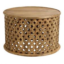 It can also be used as a coffee table, or lamp / telephone rests, etc. Round Tribal Carved Wood Coffee Table World Market