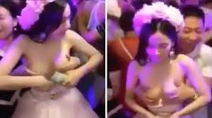 Bare boobs bride filmed being groped is not who you thought she was - Daily  Star