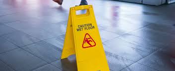 are wet floor signs required by law