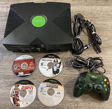 original xbox console with games and