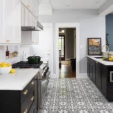 I think lower black cabinets are good if you have black or stainless appliances (range, dishwasher). White Top Cabinets Black Bottom Cabinets Design Ideas