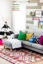 A modern abstract kid's room: 32 Kid Friendly Living Room Decorating Ideas To Fill Up With Fun Homemydesign