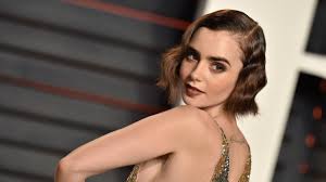 lily collins has red hair now and it s