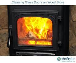 cleaning glass doors on a wood stove