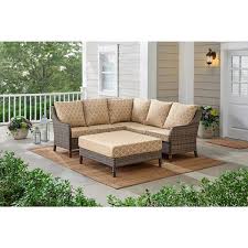 Hampton Bay Windsor 4 Piece Brown Wicker Outdoor Patio Sectional Sofa With Ottoman And Cushionguard Toffee Trellis Tan Cushions