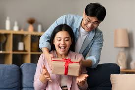 loving korean boyfriend giving gift box