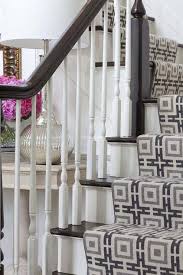 white staircase with black striped