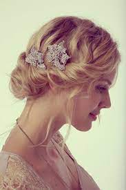 Many brides are overwhelmed by the myth that having a short hair is not beautiful for the bride. Short Curly Wedding Hairstyles With Hair Accessories And Updo Cute Ponytail Hairstyles Ponytail Hairstyles Easy Medium Hair Styles