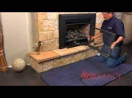 cleaning the glass on fireplaces with