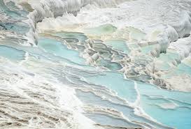 Pamukkale is a natural site that consists of hot springs and travertines, terraces of carbonate minerals left by the flowing water. Pamukkale And Hierapolis See The Cotton Castle Without The Crowd