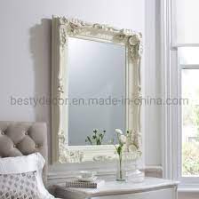 vertical ornate wall hanging mirror