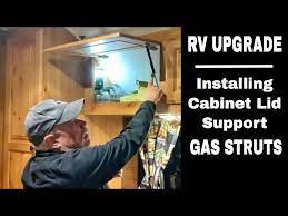 install gas strut cabinet supports