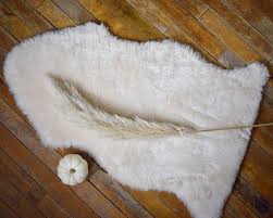 sheepskin nap play baby rug wolfie