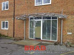 Curved Glass And Steel Panel Canopy