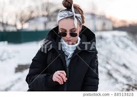 Young Hipster Woman In Black Sunglasses
