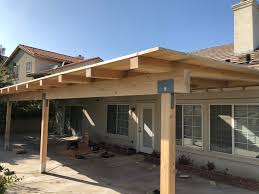 large patio cover with heavy timber