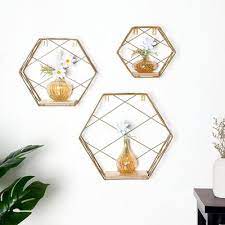 gold geometric floating wall shelves