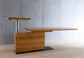 Available in a variety of finishes. Cool Computer Table For Sitting And Standing By Schulte Design