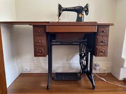 singer sewing machine table antiques