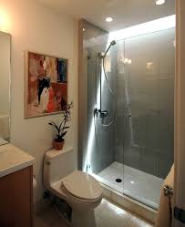 A stall shower fits perfectly in the corner of this small bathroom. Showers Bathrooms Shower Stalls The New Way Home Decor From Tips Designing And Maintain Bathroom Shower Stalls Pictures