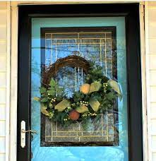 wreath on a glass storm door