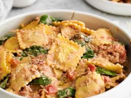 creamy ravioli with sausage and spinach