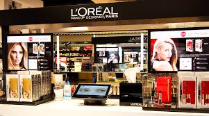 l oreal boosts cosmetics s with
