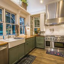 Hunter green cabinets, soft white marble and copper pots give this kitchen its quintessential english charm. 75 Beautiful Kitchen With Green Cabinets And Wood Countertops Pictures Ideas April 2021 Houzz
