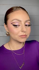 purple eyeliner glitter makeup look