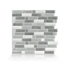 Just like a regular backsplash tile, you can choose dozens of colors with peel and stick backsplashes. Smart Tiles Crescendo Agati 9 73 In W X 9 36 In H Gray Peel And Stick Self Adhesive Decorative Mosaic Wall Tile Backsplash Sm1111g 01 Qg The Home Depot