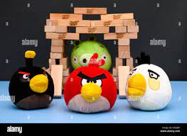 Bomb, Matilda and Red Angry Birds standing in front of Bad Piggy sitting  inside of house, made from Jenga bricks Stock Photo - Alamy