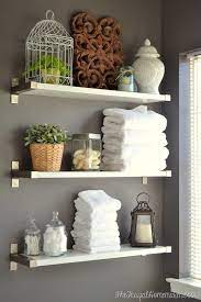 The bathroom has an open shelving unit with an insert for accessories. 15 Diy Space Saving Bathroom Shelving Ideas Ikea Ekby Shelf Space Saving Bathroom Shelves
