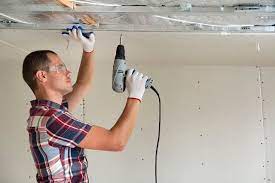 how much to charge to hang drywall