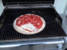 grilling pizza on a weber genesis the