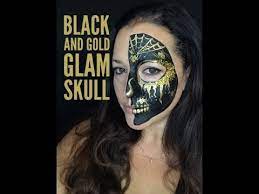 black and gold glam skull face paint
