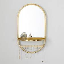 gold arched wall jewelry storage mirror