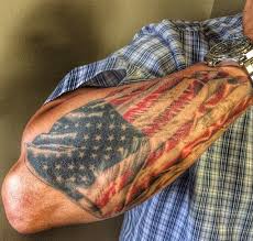 The shading creates a waving effect on the flag and the design is instantly recognizable. Black And White American Flag Forearm Tattoo