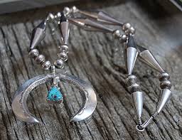 sterling silver naja with one turquoise