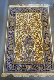 a sarook kashan silk rug of pictorial
