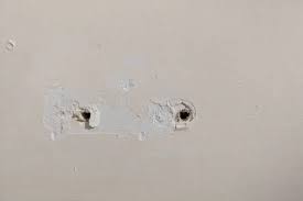 How To Fix Nail Holes In Walls Without