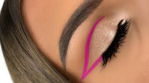 graphic pink winged eyeliner with