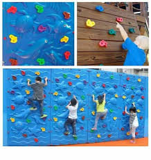 outdoor sports children climbing rock